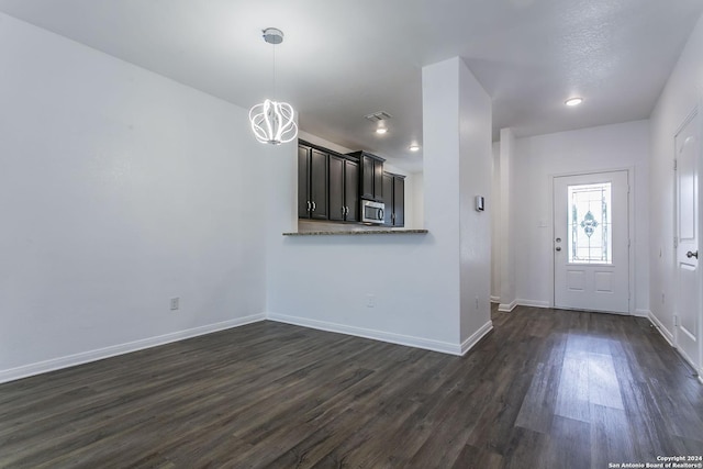 foyer featuring dark hardwood / wood-style floors