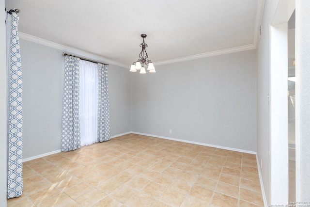 spare room featuring ornamental molding and a notable chandelier