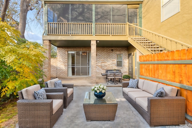 view of patio / terrace featuring outdoor lounge area and a balcony