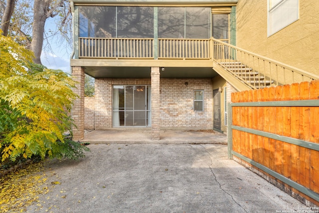 rear view of house featuring a patio