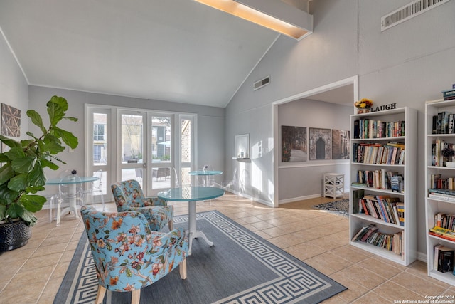 interior space featuring high vaulted ceiling