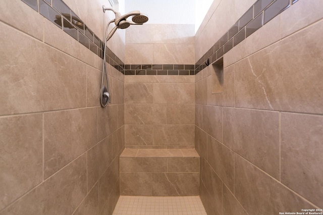 interior space featuring a tile shower