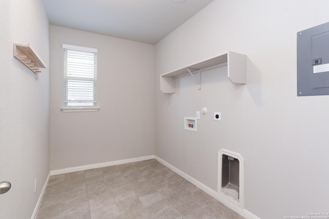 clothes washing area featuring electric panel, hookup for a gas dryer, washer hookup, and hookup for an electric dryer