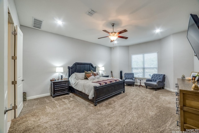 carpeted bedroom featuring ceiling fan