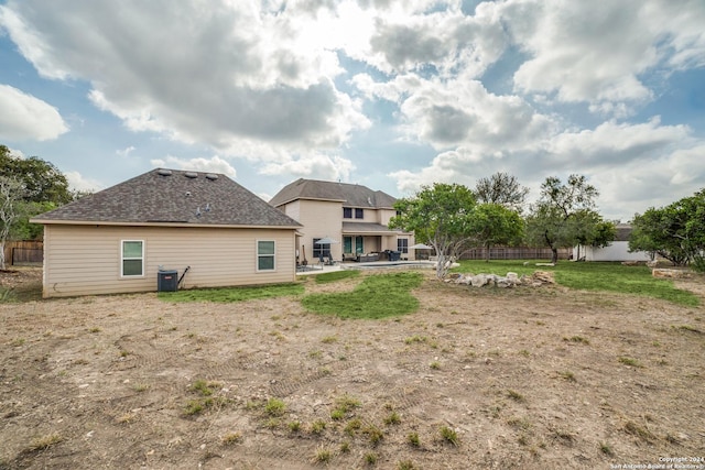 back of house featuring a patio and central AC