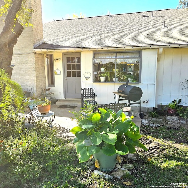 doorway to property featuring a patio area