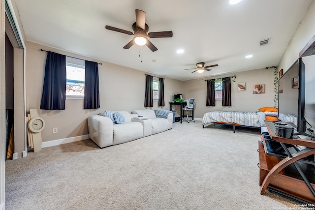 bedroom with ceiling fan and carpet