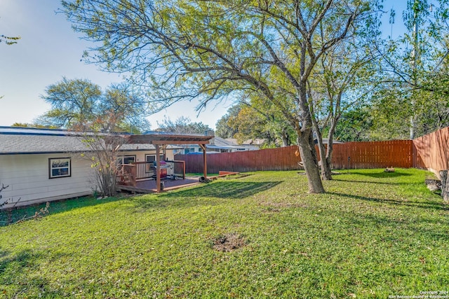 view of yard with a pergola and a wooden deck