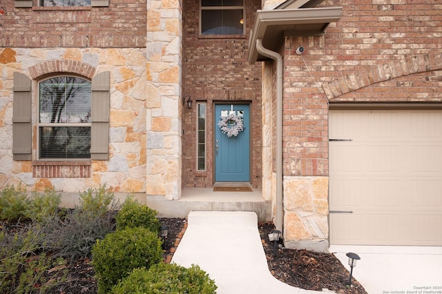 entrance to property featuring a garage