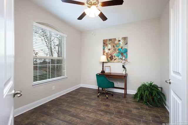 office space featuring ceiling fan and dark hardwood / wood-style flooring