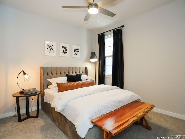 carpeted bedroom featuring ceiling fan