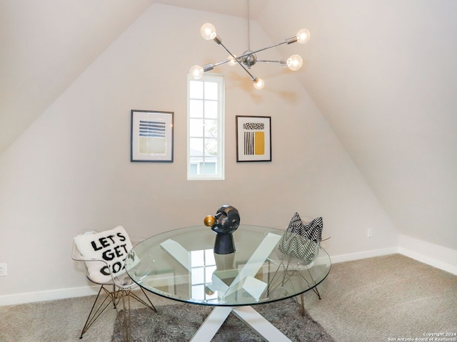 dining area with carpet, an inviting chandelier, and lofted ceiling