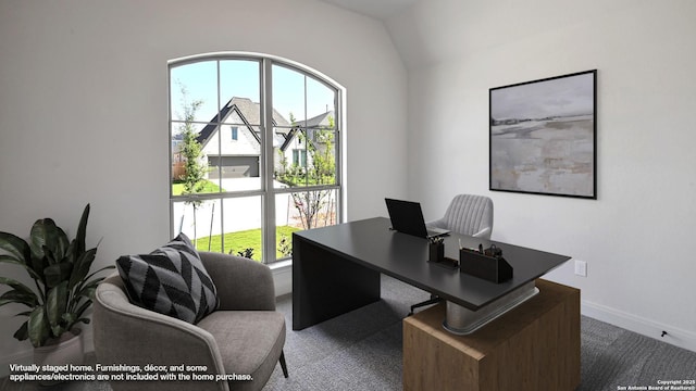 office space featuring baseboards and carpet