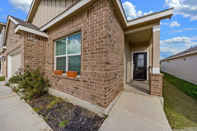 entrance to property featuring a garage