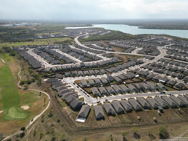 bird's eye view with a water view