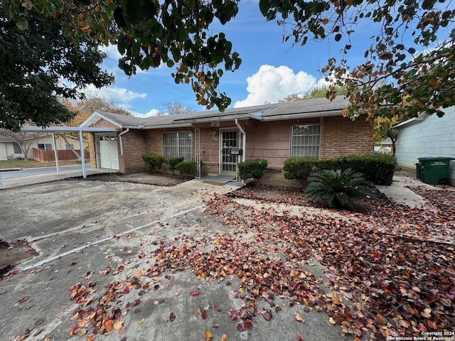 ranch-style home with a garage