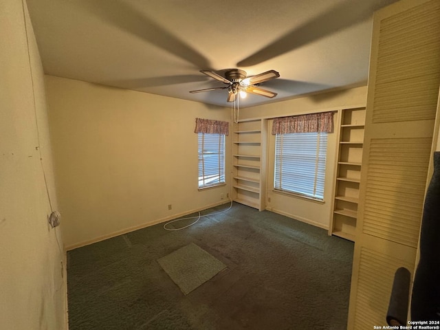 carpeted empty room with ceiling fan