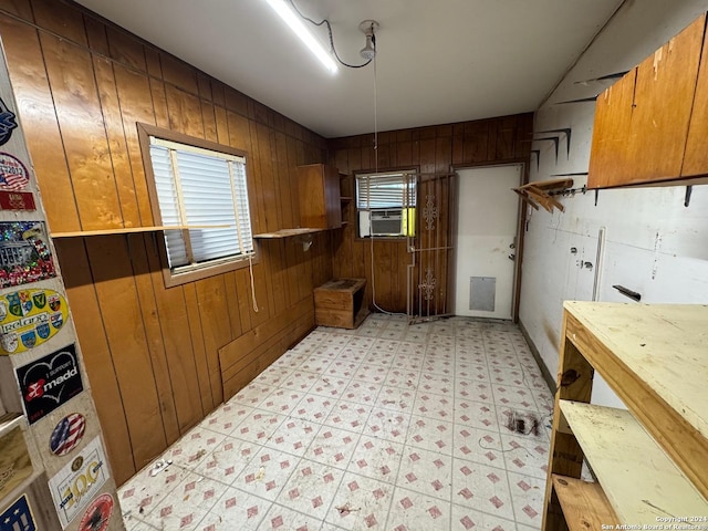 kitchen with wood walls and cooling unit