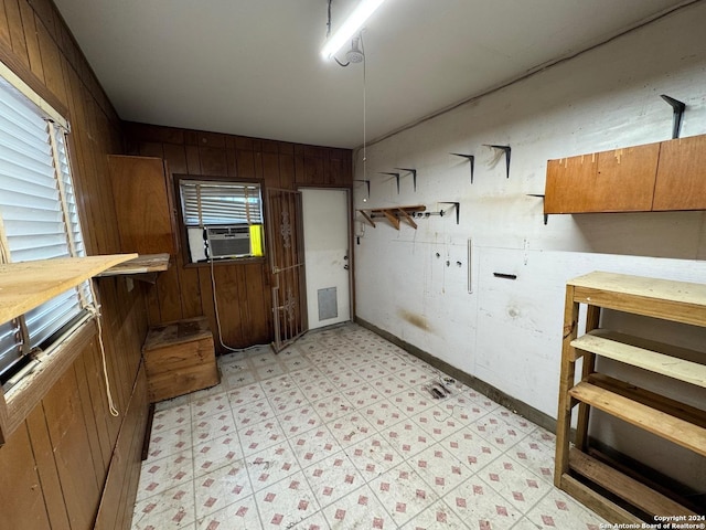 kitchen with wood walls and cooling unit