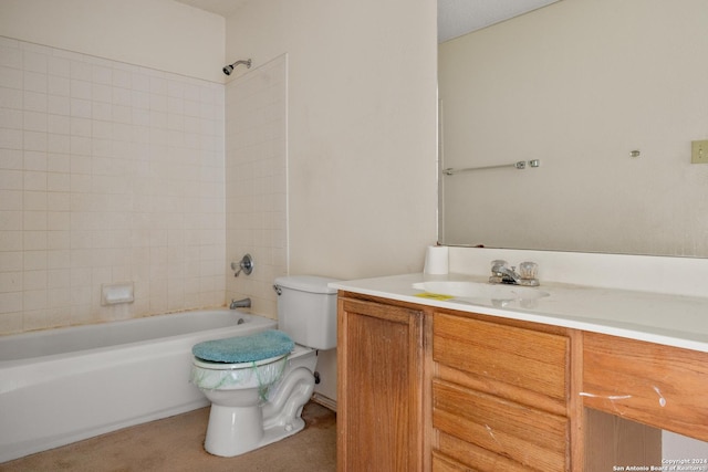 full bathroom with vanity, toilet, and tiled shower / bath