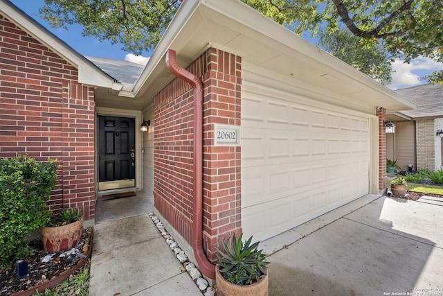 property entrance featuring a garage