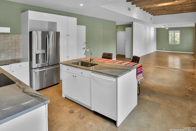 kitchen with sink, beamed ceiling, dishwasher, white cabinets, and stainless steel fridge with ice dispenser