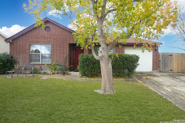 ranch-style home with a garage and a front lawn