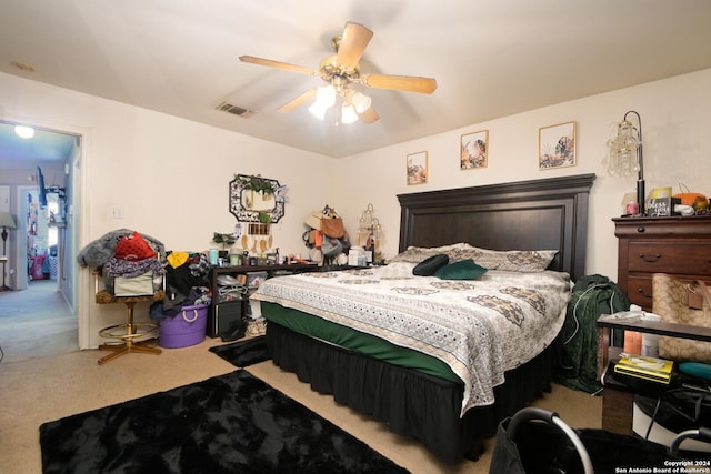 carpeted bedroom featuring ceiling fan