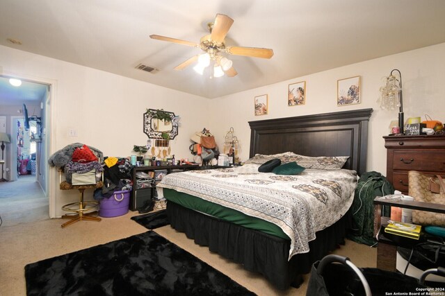 bedroom featuring carpet and ceiling fan