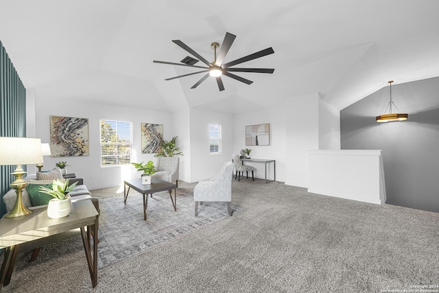 living room with carpet flooring, ceiling fan, and vaulted ceiling