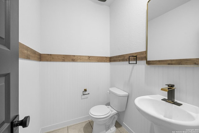 bathroom featuring tile patterned floors, sink, and toilet