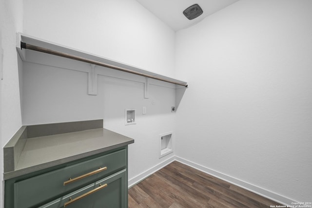 laundry area featuring electric dryer hookup, hookup for a washing machine, and dark wood-type flooring