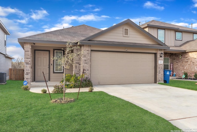 view of front of home featuring a garage and a front lawn