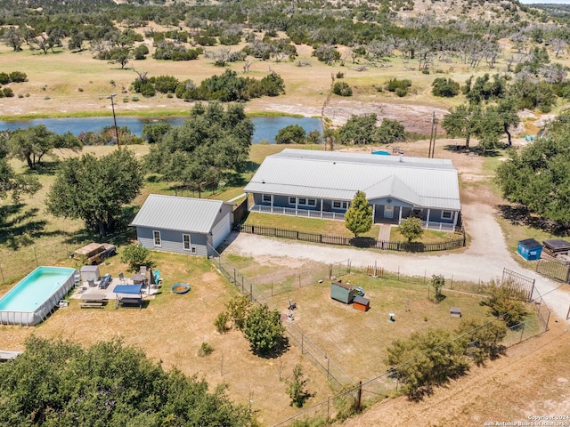 aerial view featuring a rural view and a water view