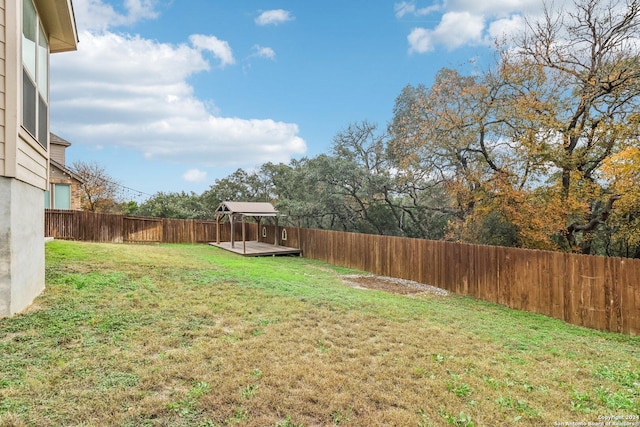 view of yard with a deck