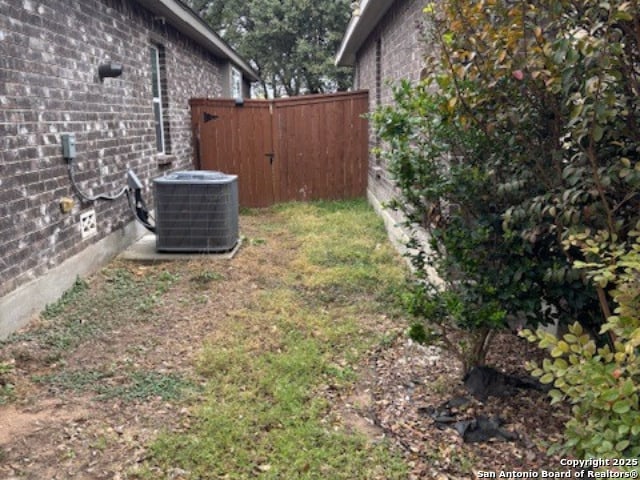 view of yard with cooling unit