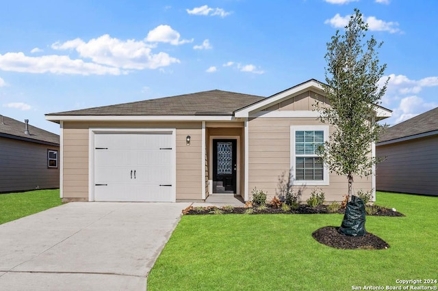 ranch-style home featuring a front yard and a garage