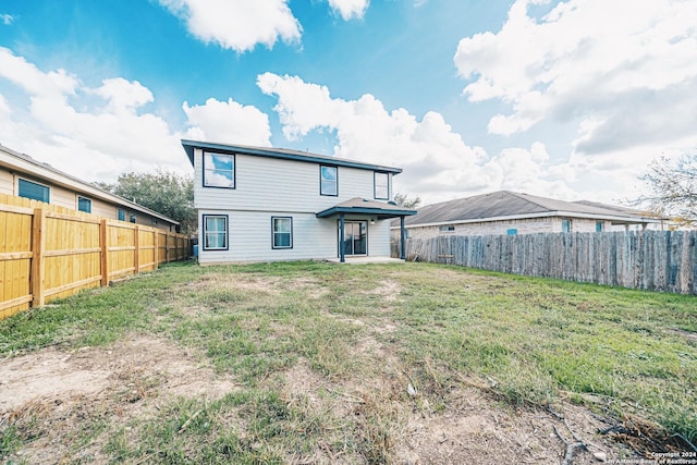 7427 Vega Gap, San Antonio, TX 78252 - back of house with a fenced backyard and a patio