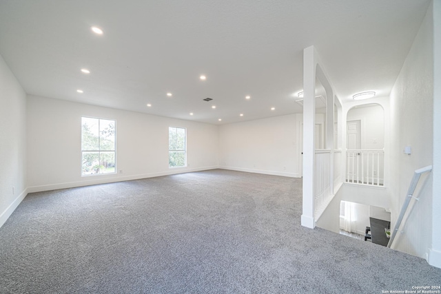 7427 Vega Gap, San Antonio, TX 78252 - carpeted spare room featuring recessed lighting and arched walkways