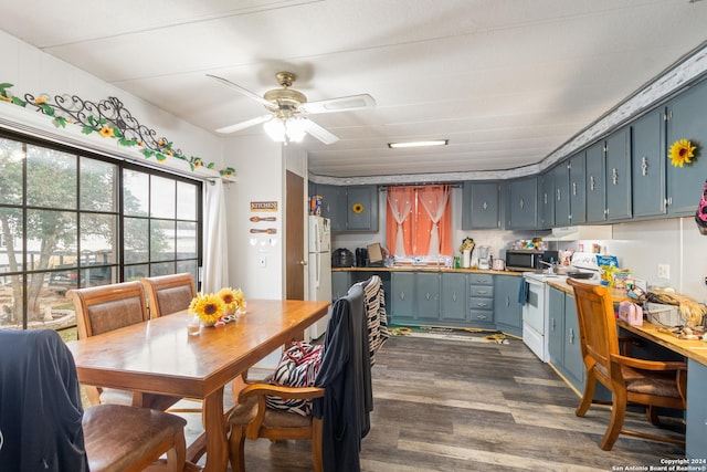 kitchen with blue cabinetry, dark hardwood / wood-style floors, white range with electric stovetop, and ceiling fan