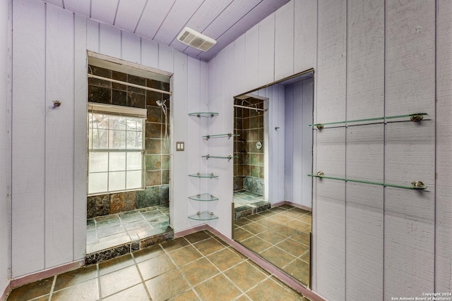 bathroom with wooden walls