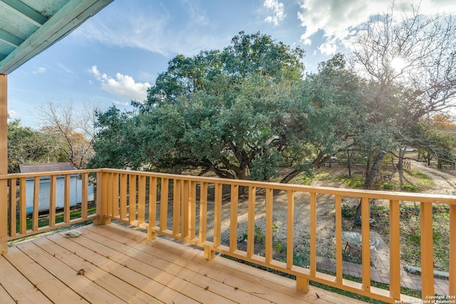 deck featuring a storage shed