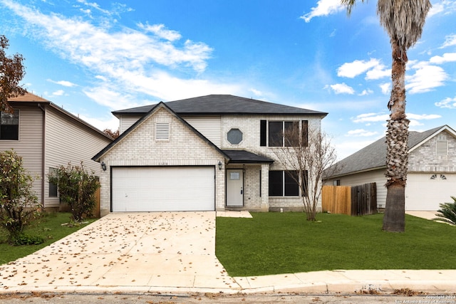 front of property featuring a front yard and a garage