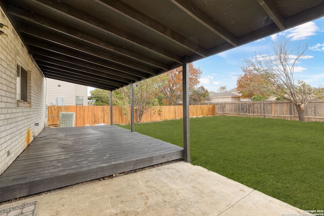 deck featuring a lawn