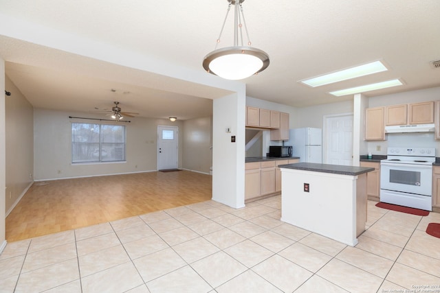 kitchen featuring ceiling fan, a center island, hanging light fixtures, white appliances, and light wood-type flooring