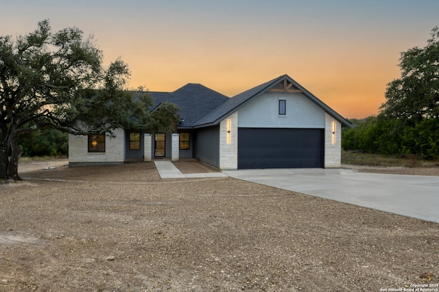 view of front of property featuring a garage