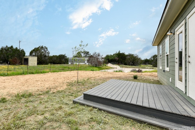 view of yard with a deck