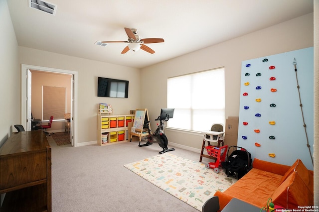 playroom featuring carpet flooring and ceiling fan