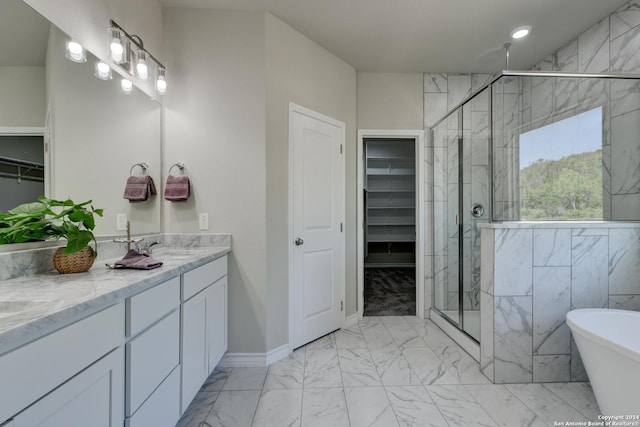 bathroom featuring vanity, shower with separate bathtub, and tile walls