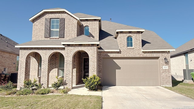 view of front facade with a garage and a front yard